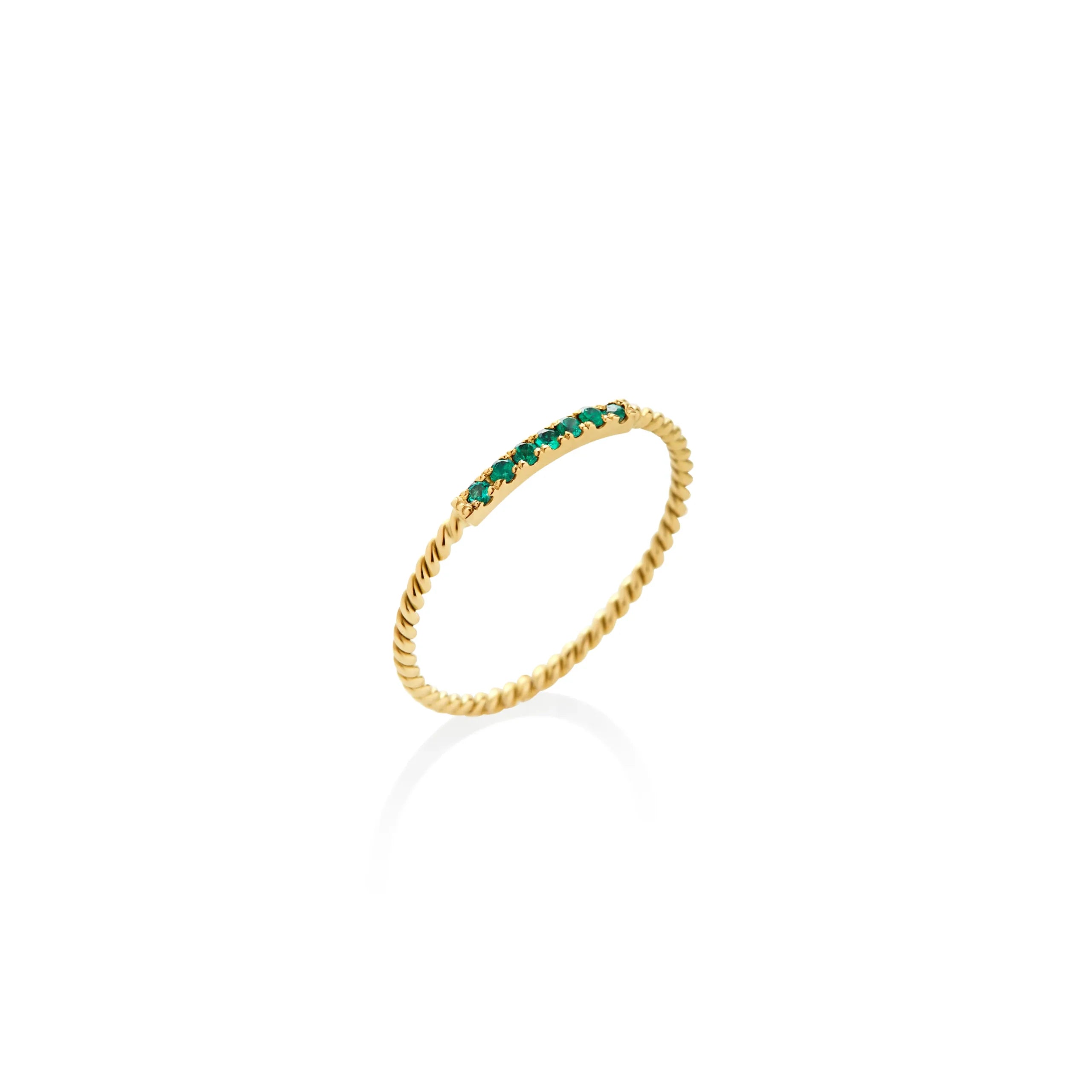 ANILLO ENTORCHADO CON ESMERALDAS EN ORO 18K - Gallery 1