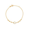 PULSERA BOLITAS CON ESTRELLA EN ORO 18K