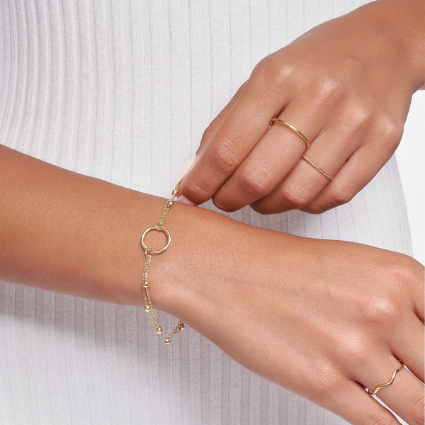 PULSERA KARMA CON DOBLE CADENA EN ORO 18K - Secondary