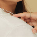 Aretes y pulsera de perlas