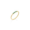 ANILLO ENTORCHADO CON ESMERALDAS EN ORO 18K