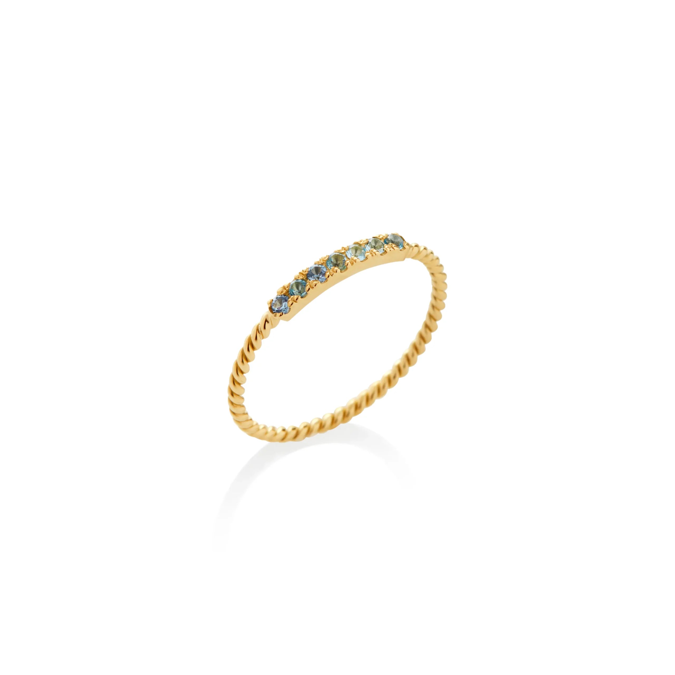 ANILLO ENTORCHADO CON TOPACIOS AZULES EN ORO 18K - Gallery 1