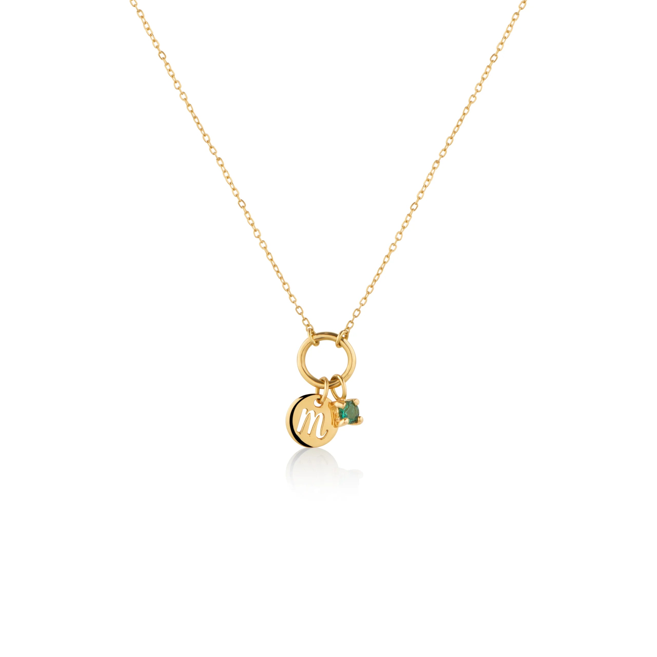 COLLAR ARO CON PLACA INICIAL M Y ESMERALDA EN ORO 18K - Gallery 1