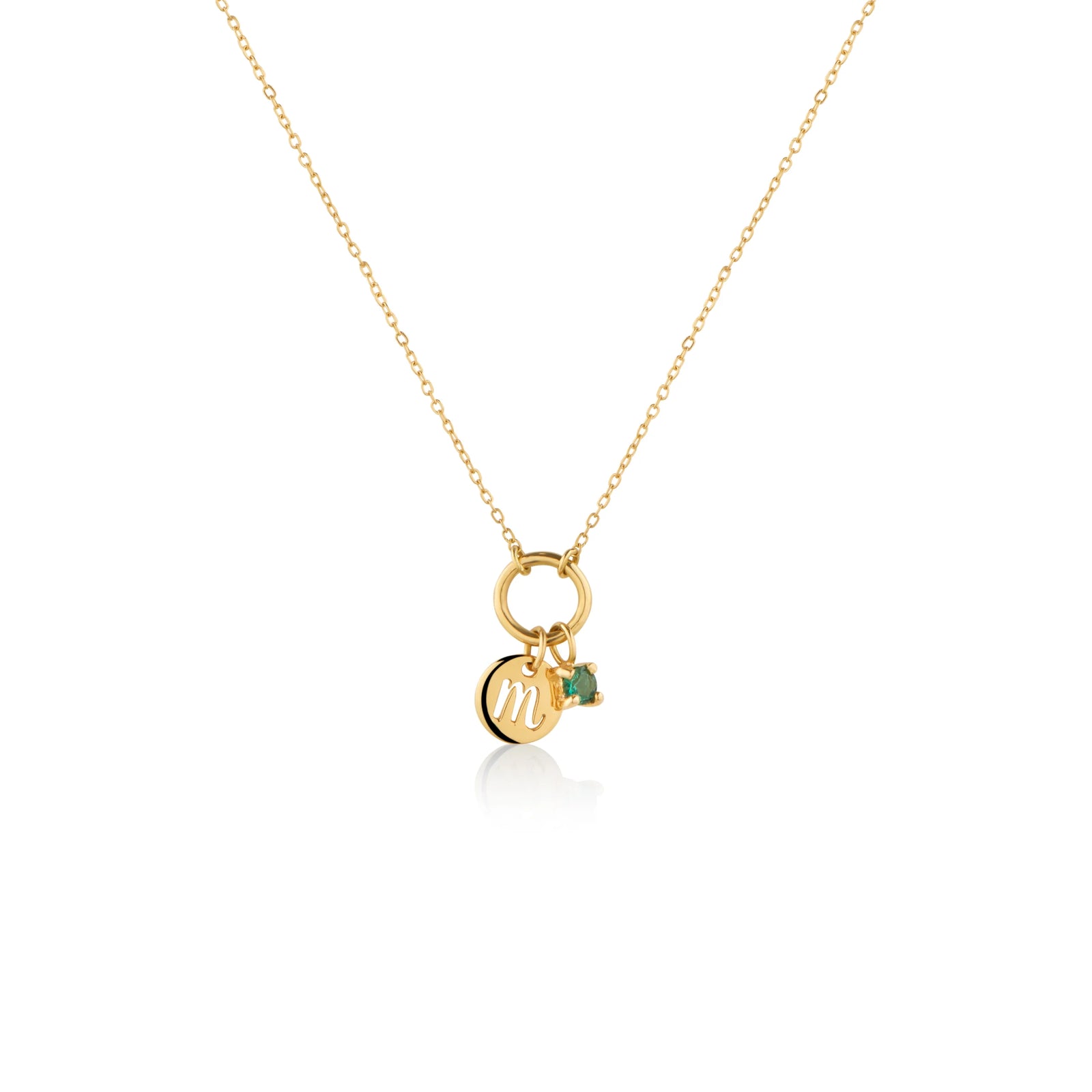 COLLAR ARO CON PLACA INICIAL M Y ESMERALDA EN ORO 18K - Image 1