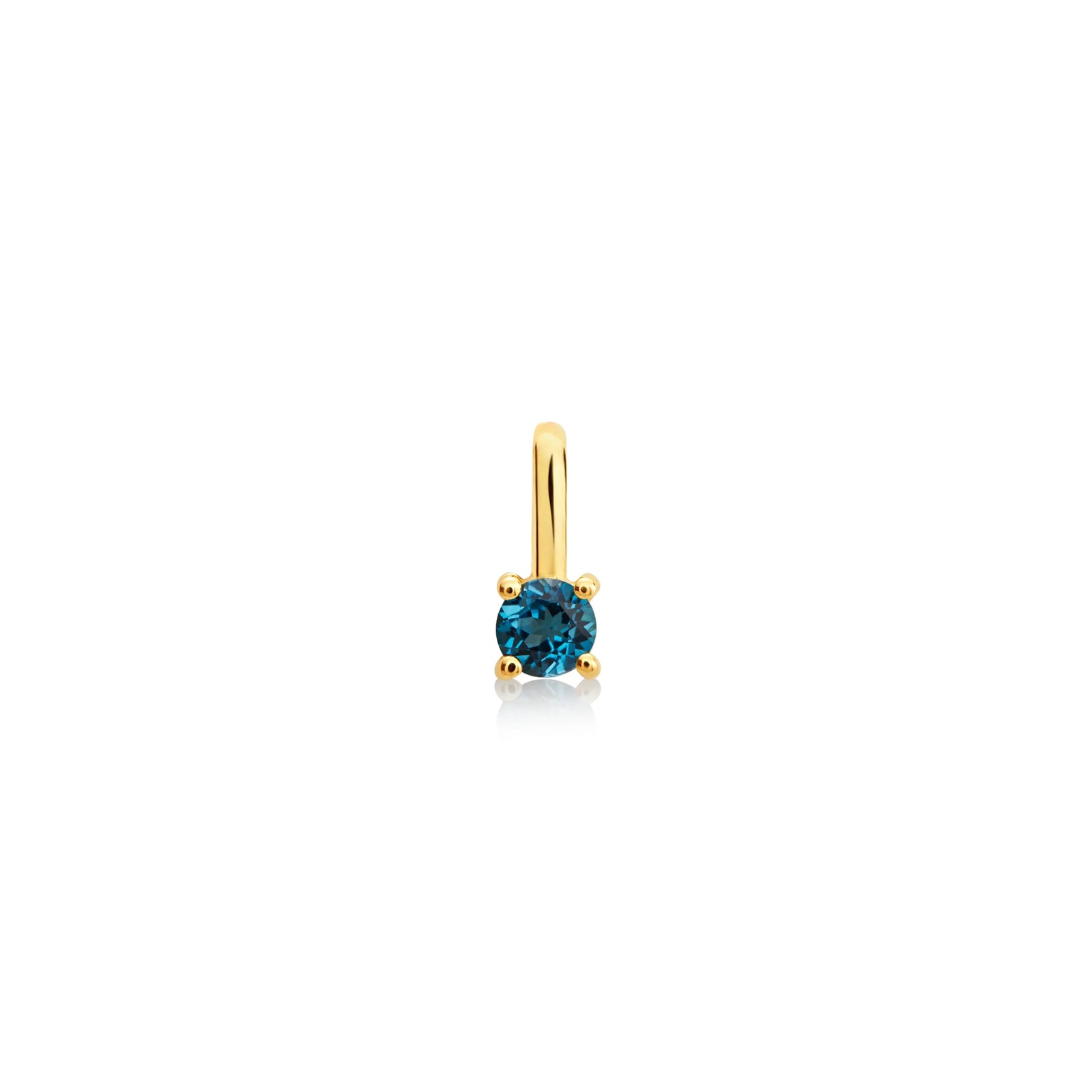 DIJE PIEDRA TOPACIO LONDON EN ORO 18K - Image 1