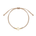 PULSERA HILO ESTRELLA CALADA MINI EN ORO 18K - Thumbnail 1